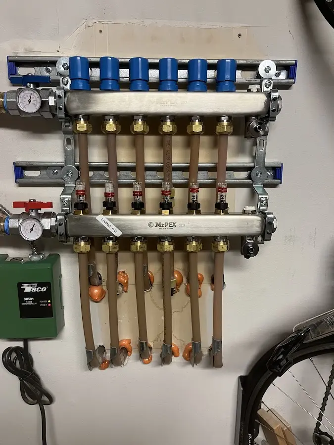 Plumber performing Leak Detection at a residential property in Gates